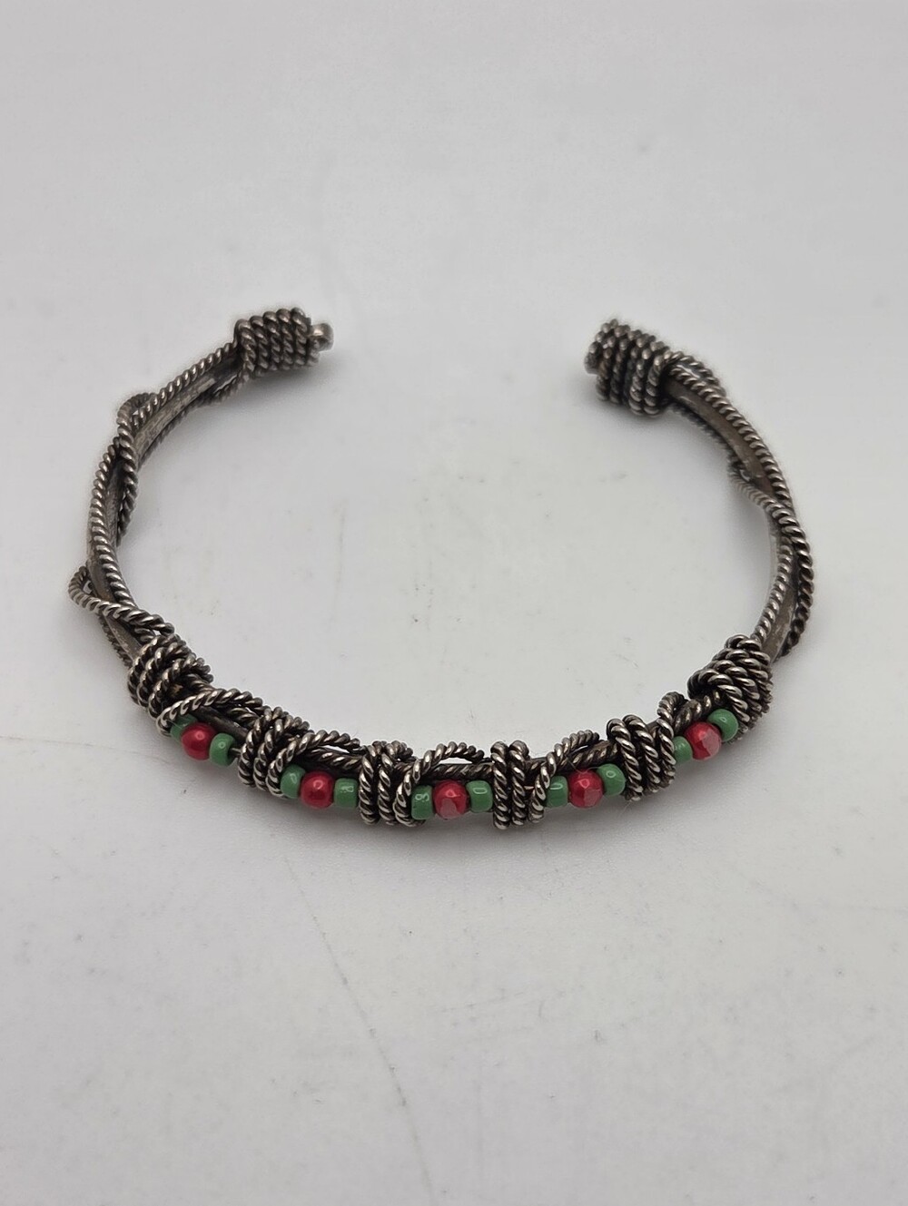 Handcrafted Silver-Tone Rope Cuff Bracelet with Red and Green Beads
